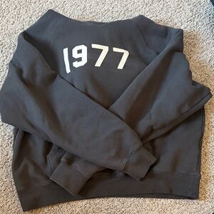Essentials Black Crewneck Sweater with 1977 Design